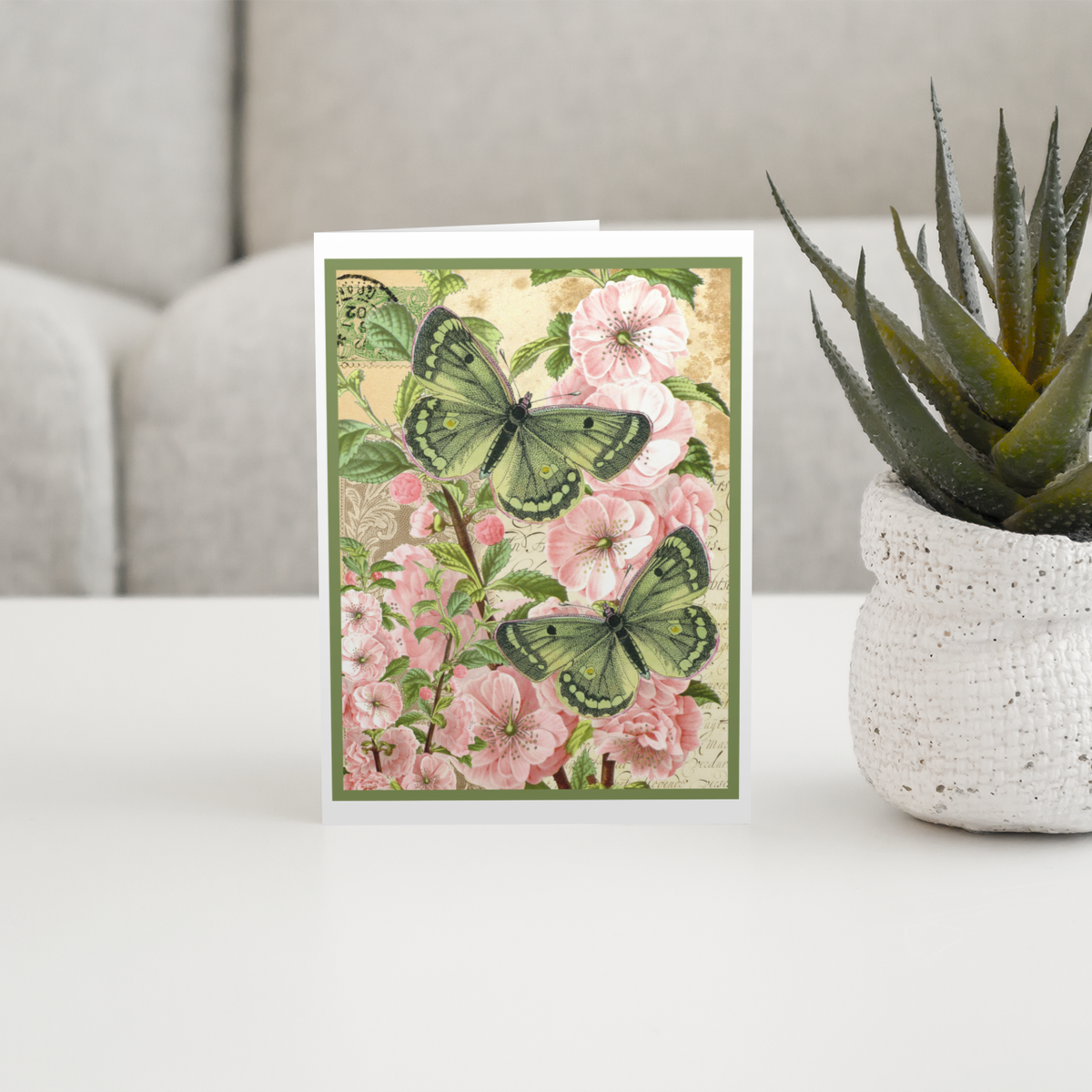 Greeting Card. Pink Flowers with Green Moths.