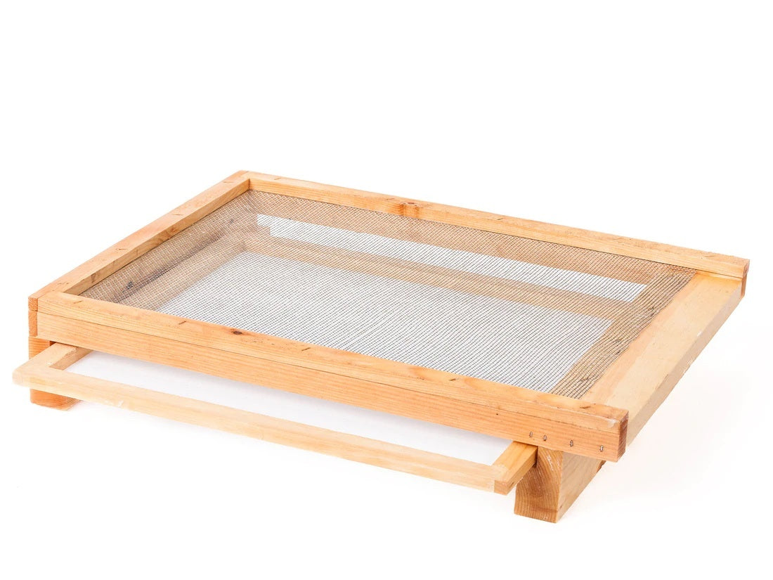 Screened bottom board side drawer